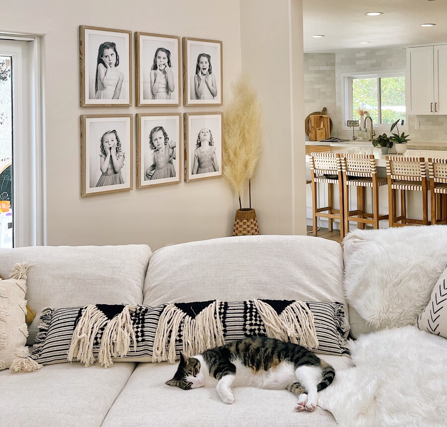 Gallery wall of framed family photos - Level Frames