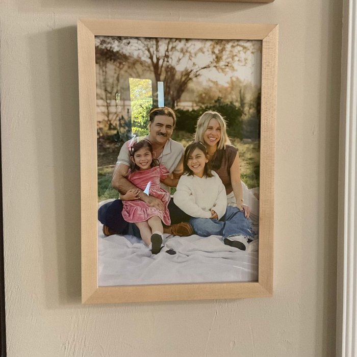 Verified review from Cathy Guy: "I wanted to frame a lovely picture of my daughter, son-in-law, and 2 granddaughters.  My daughter suggested Level Frames, and I'm so glad she did.  I chose the frame I wanted out of a wonderful online selection.  I uploaded the photo, and placed my order.  My order was delivered in a very timely fashion, and I love it!  Level Frames did a great job, and I hung it on the wall, and I am very pleased.  They did a great job, and the price was very reasonable!  I will definitely order from Level Frames again."