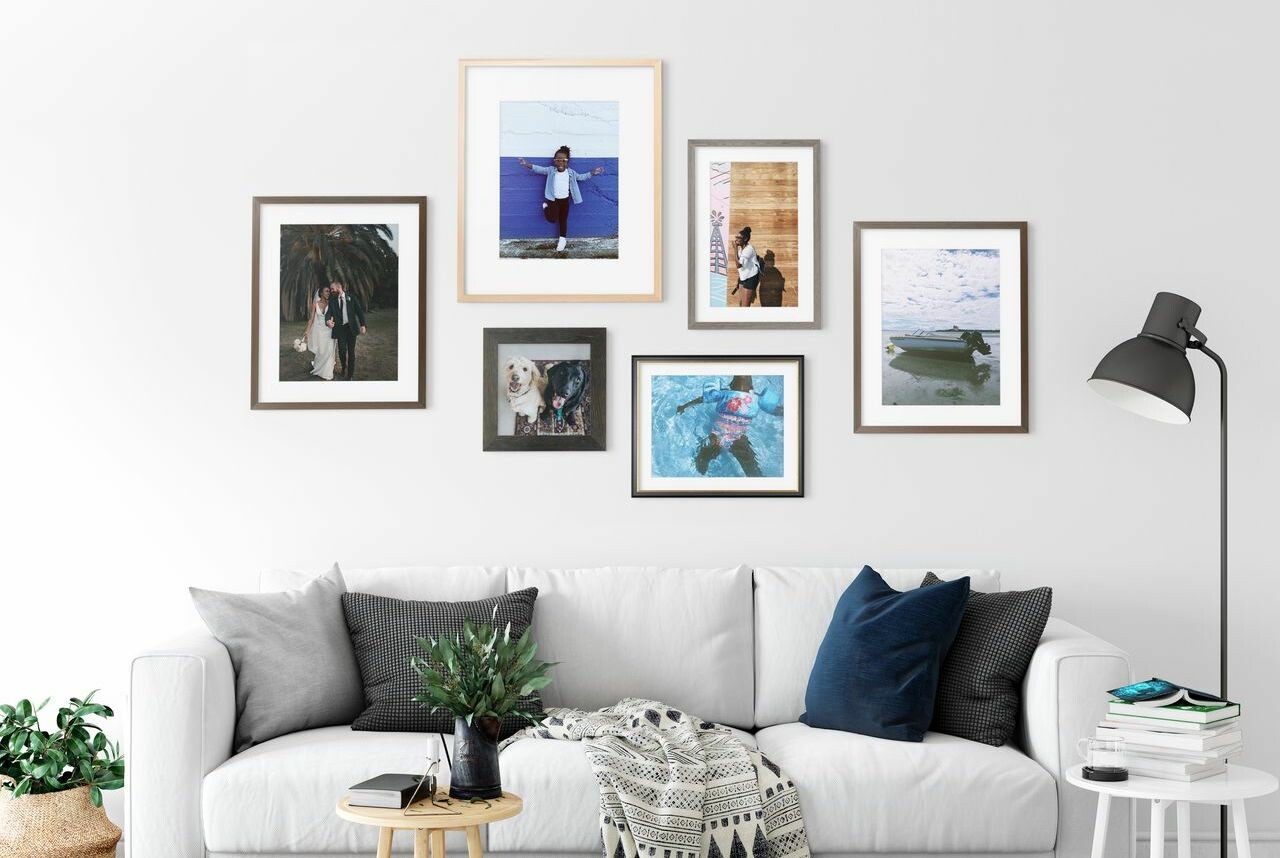 Curates gallery walls of framed photos from Level Frames
